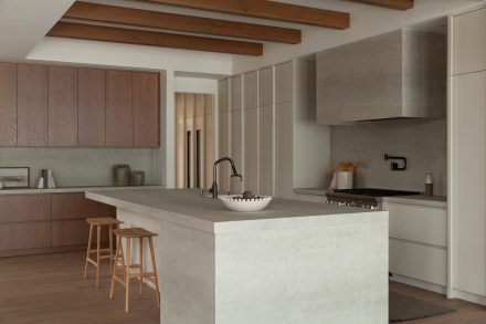 Dans cette cuisine minimaliste imaginée et conçue par Ateliers Jacob, les lignes épurées dialoguent avec une palette de couleurs douces et terreuses. Photo : Ateliers Jacob