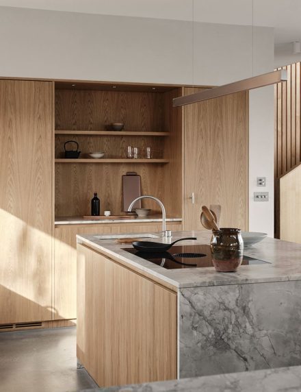 Architect's house interior. Site-built wooden kitchen in a modern design. Interior in Scandinavian style.